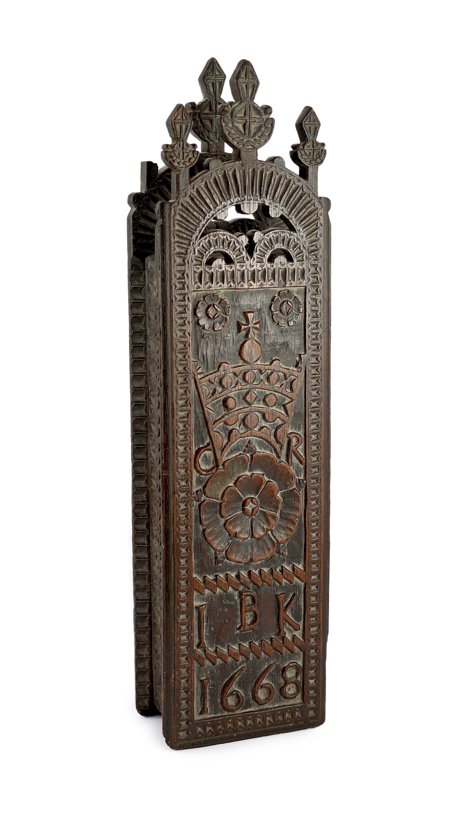 An antique carved oak cased tobacco rasp, 49 x 13cm depth 7cm